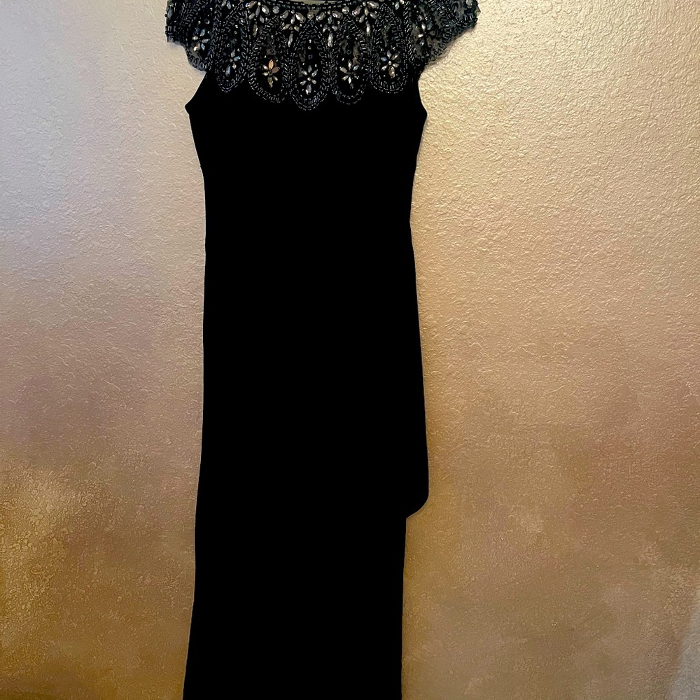 Beautiful navy sequin dress wore once to a wedding. In perfect condition
